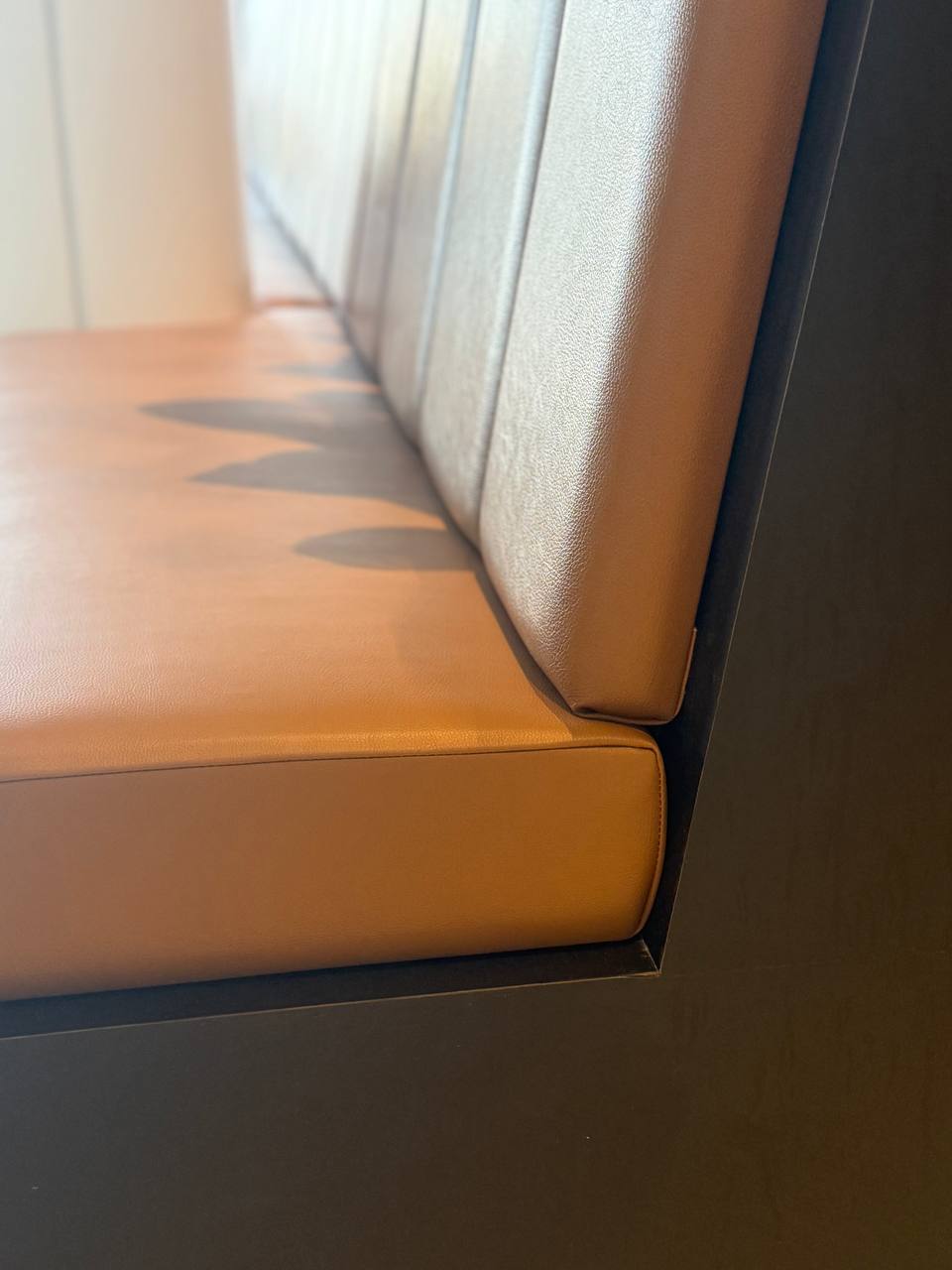 Emerald green velvet commercial banquette — custom banquette manufacturing Montreal by Atlas Upholstering