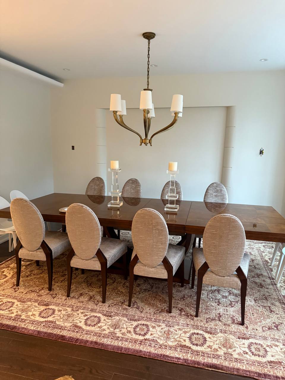 Oval-back upholstered dining chairs in formal dining room — dining chair reupholstery Montreal by Atlas Upholstering