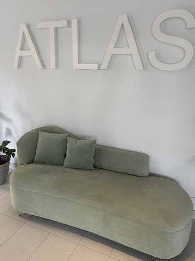 Custom dark green velvet curved sectional ottoman pieces — bespoke furniture manufacturing Montreal by Atlas